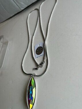 Swarovski aurore boreale cat eyed crystal pendant and necklace.